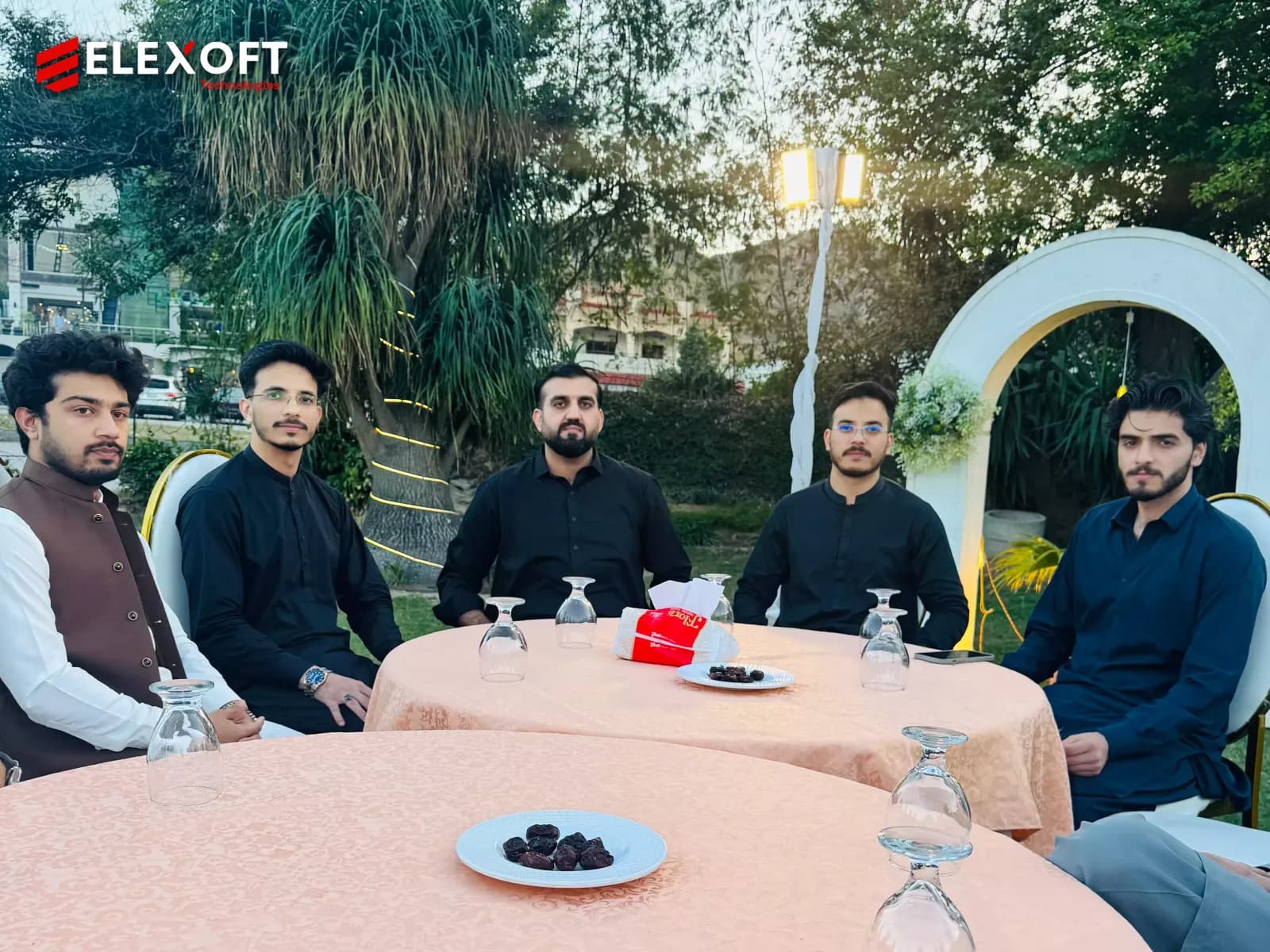 Software development services team sharing an Iftar gathering