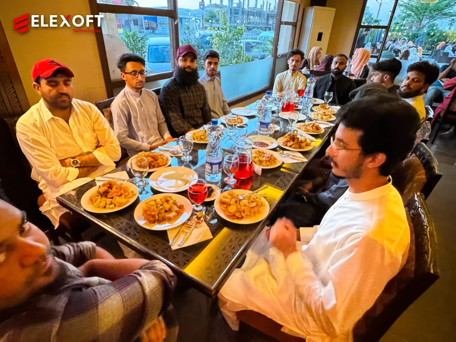 Software house Pakistan team enjoying dinner together