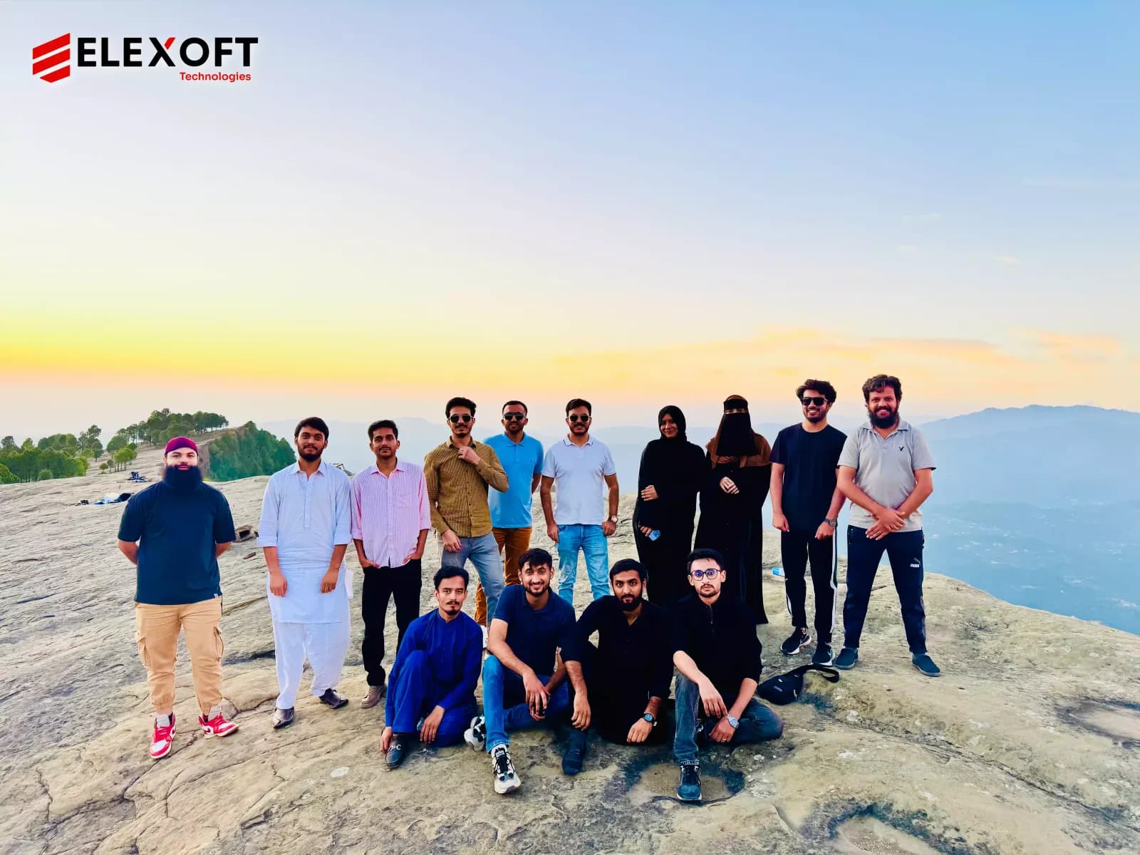 Software development services team enjoying a mountain adventure