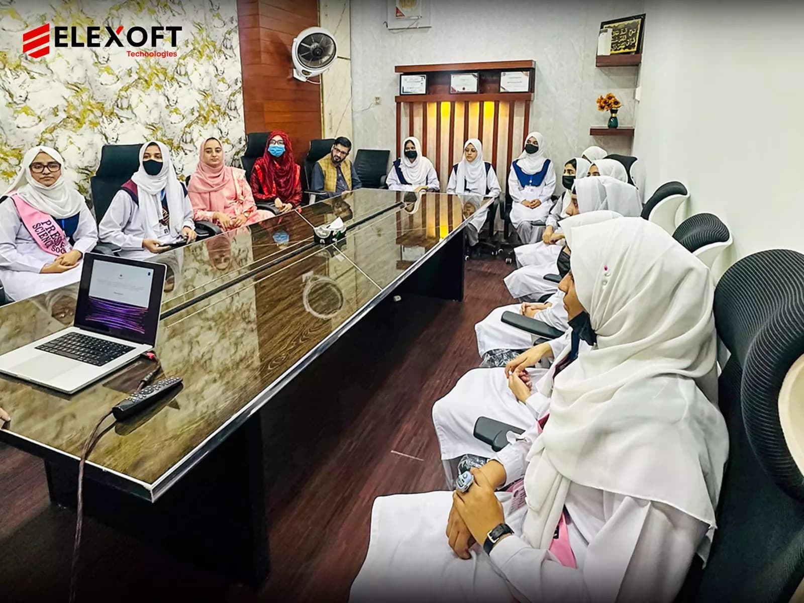 IT solutions provider team engaging with students at Elexoft