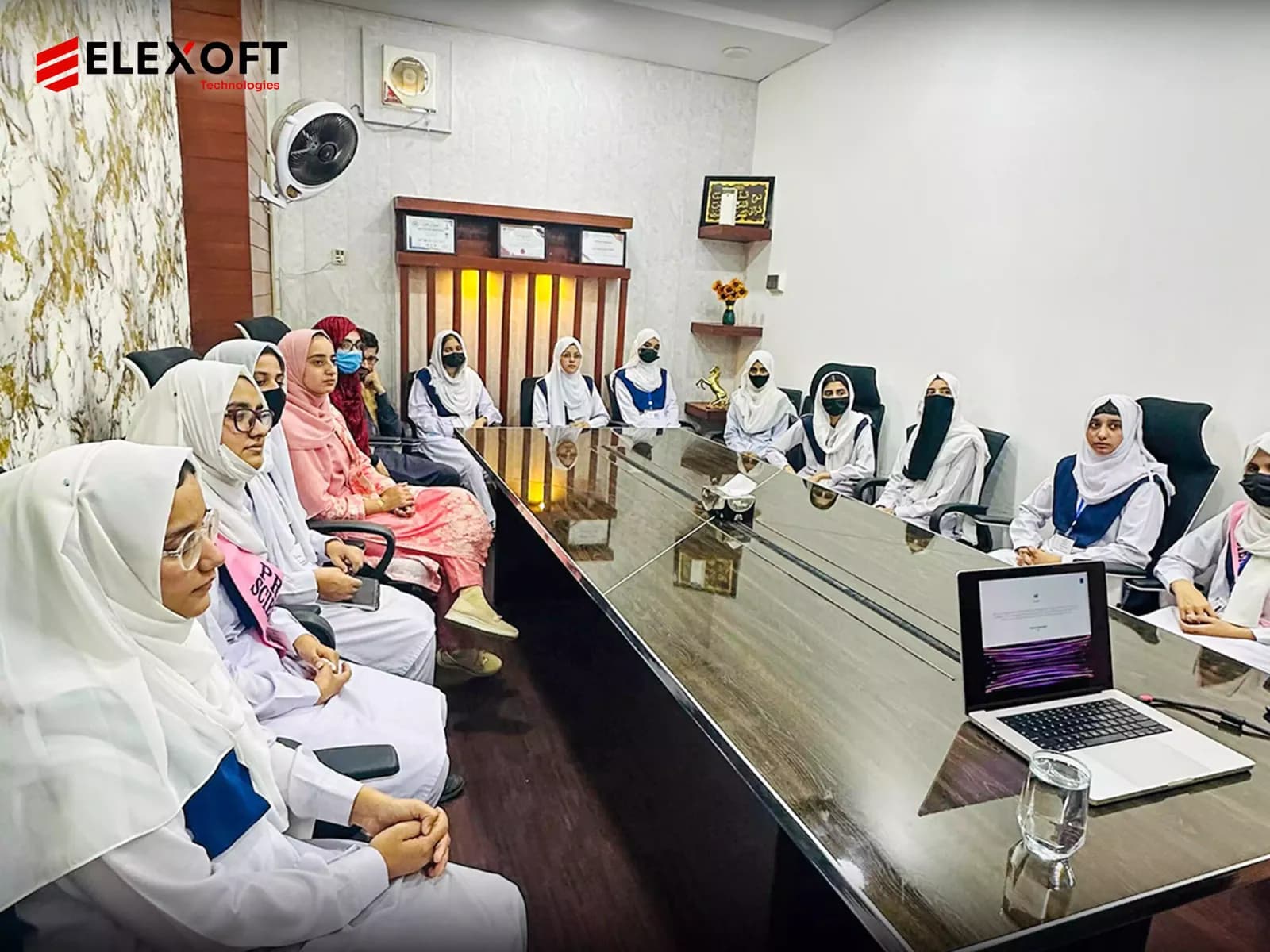 Software solutions company team hosting an academic industry session