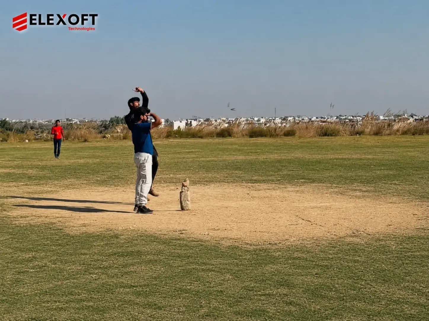 IT services company employees collaborating during a team event